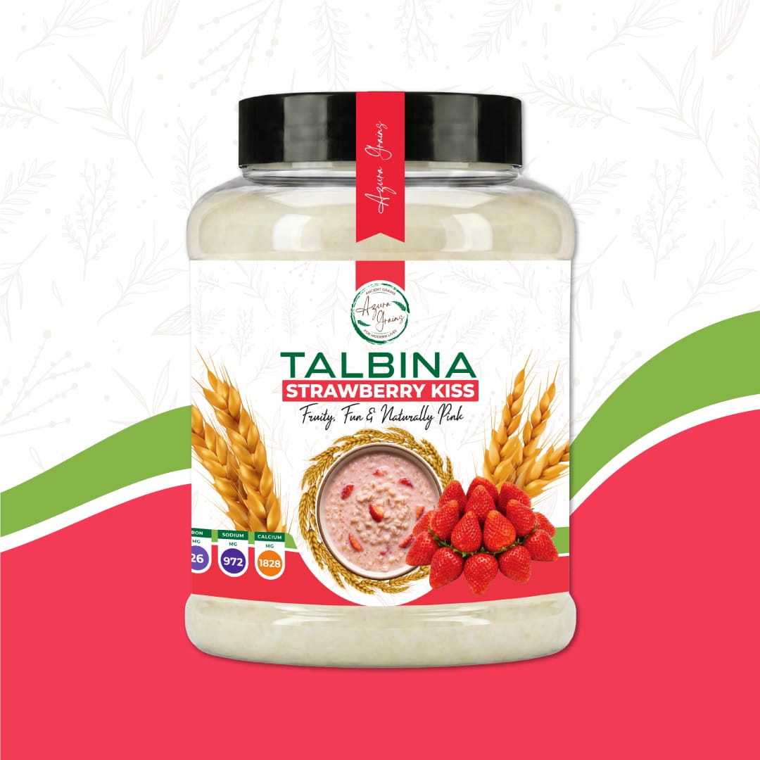 Strawberry Kiss Talbina by Azura Grains – naturally pink strawberry-flavored barley porridge in a bowl with fresh strawberry slices